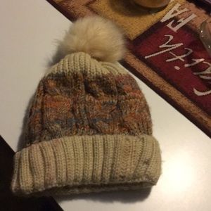 Hat with soft ball on top